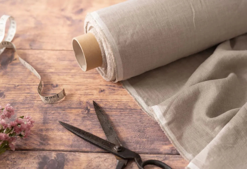 How does linen fabric differ from other natural fibers in terms of breathability and comfort?